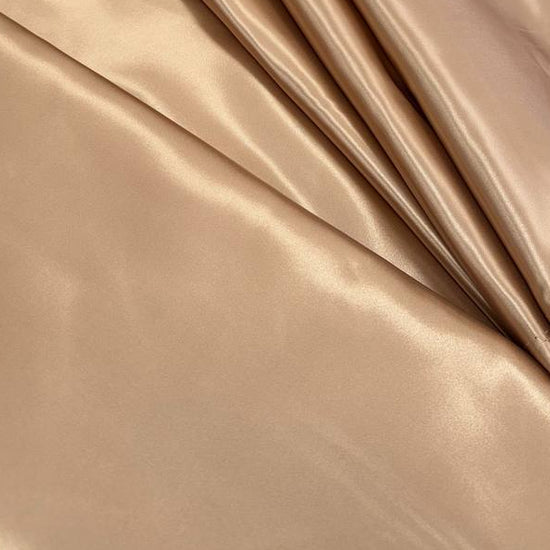Alt text:
Satin De Luxe polyester fabric available in multiple colours including black, brown, off white, bottle green, poudre pink, antracite grey, optical white, red and navy.