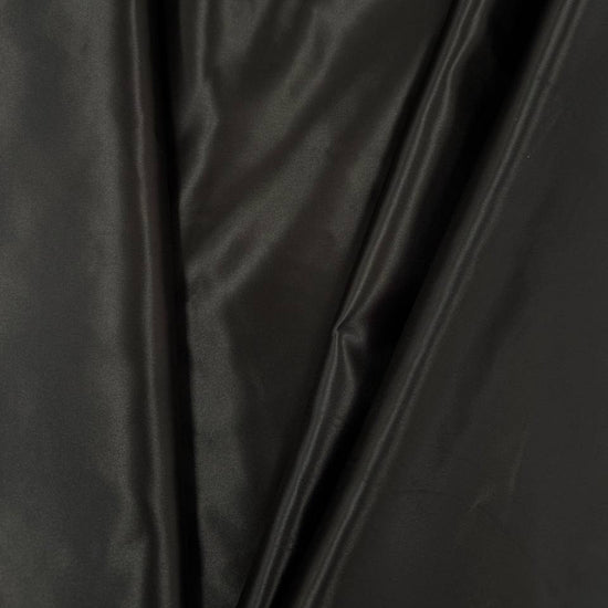 Alt text:
Satin De Luxe polyester fabric available in multiple colours including black, brown, off white, bottle green, poudre pink, antracite grey, optical white, red and navy.