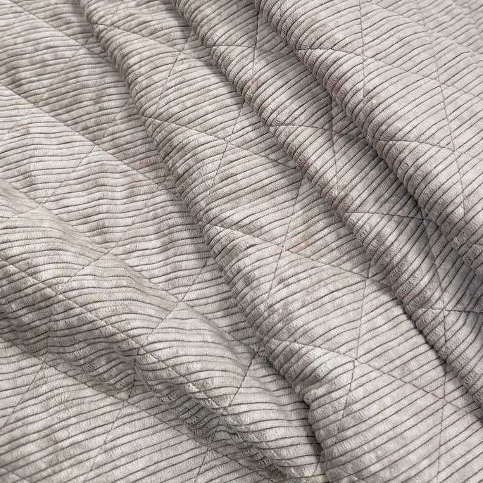Quilted ribbed corduroy fabric with soft plush backing available in Champagne, Brown, Khaki, Taupe and Sand