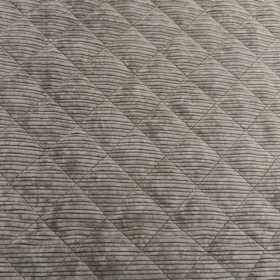Quilted ribbed corduroy fabric with soft plush backing available in Champagne, Brown, Khaki, Taupe and Sand
