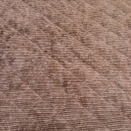 Quilted ribbed corduroy fabric with soft plush backing available in Champagne, Brown, Khaki, Taupe and Sand