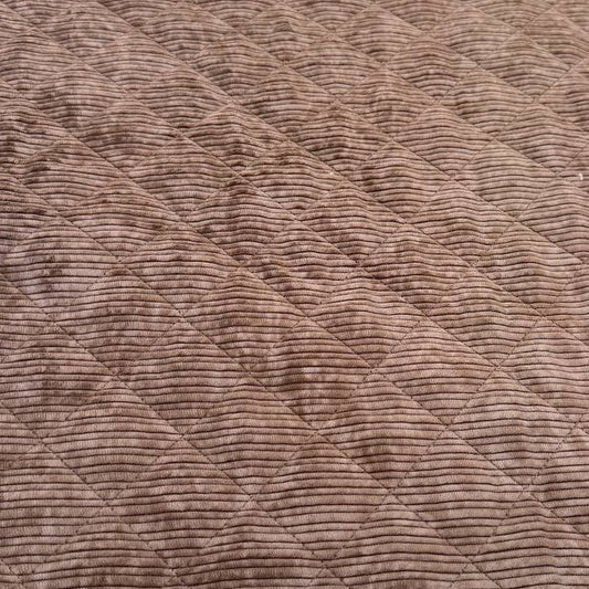 Quilted ribbed corduroy fabric with soft plush backing available in Champagne, Brown, Khaki, Taupe and Sand