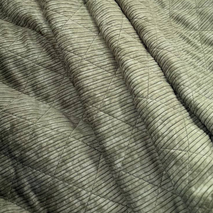 Quilted ribbed corduroy fabric with soft plush backing available in Champagne, Brown, Khaki, Taupe and Sand