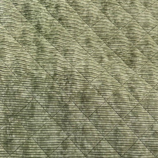 Quilted ribbed corduroy fabric with soft plush backing available in Champagne, Brown, Khaki, Taupe and Sand
