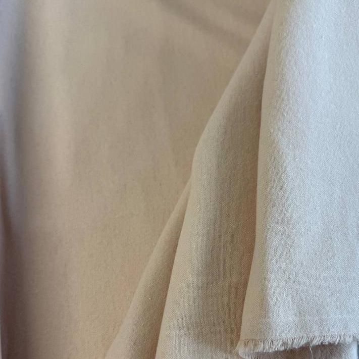 Flannel Snuggle MK Solid Beige flannel fabric, 100% cotton, soft neutral beige flannel perfect for quilts, nursery projects, and cozy apparel.