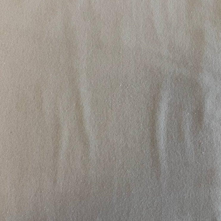 Flannel Snuggle MK Solid Beige flannel fabric, 100% cotton, soft neutral beige flannel perfect for quilts, nursery projects, and cozy apparel.