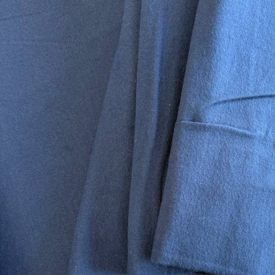 Flannel Snuggle MK Solid Navy flannel fabric, 100% cotton, soft dark blue flannel suitable for quilting, blankets, pajamas, and home décor.