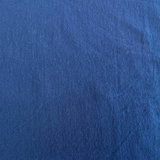 Flannel Snuggle MK Solid Navy flannel fabric, 100% cotton, soft dark blue flannel suitable for quilting, blankets, pajamas, and home décor.