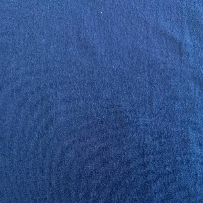 Flannel Snuggle MK Solid Navy flannel fabric, 100% cotton, soft dark blue flannel suitable for quilting, blankets, pajamas, and home décor.