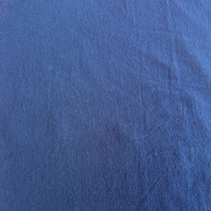 Flannel Snuggle MK Solid Navy flannel fabric, 100% cotton, soft dark blue flannel suitable for quilting, blankets, pajamas, and home décor.