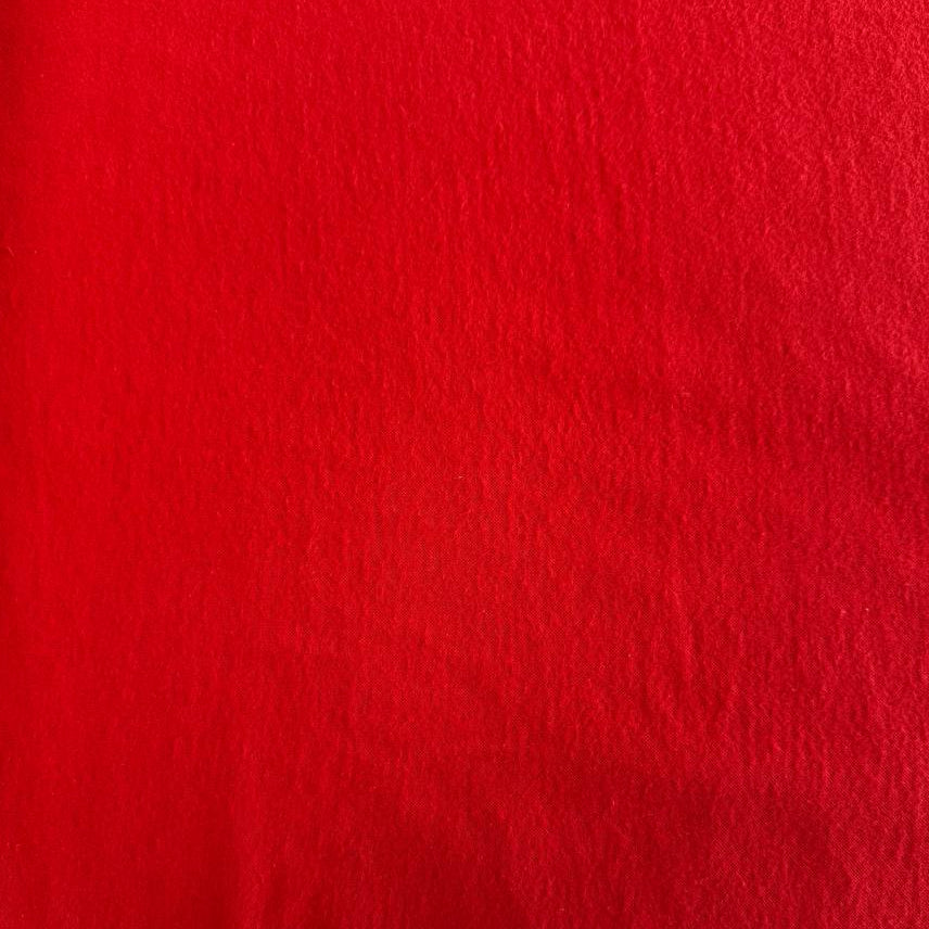 Flannel Snuggle MK Solid Red flannel fabric, 100% cotton, soft solid red flannel for quilting, blankets, pajamas, and sewing projects.