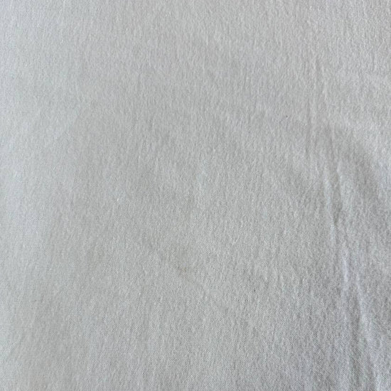 Flannel Snuggle MK Solid Light Blue flannel fabric, 100% cotton, soft solid light blue flannel ideal for quilting, baby blankets, pajamas, and crafts.