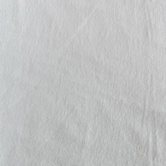 Flannel Snuggle MK Solid Light Blue flannel fabric, 100% cotton, soft solid light blue flannel ideal for quilting, baby blankets, pajamas, and crafts.