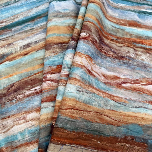 Stonehenge Canyon Blue Multi 100% cotton fabric with abstract blue, teal, turquoise, rust, brown and cream textured brushstroke design.