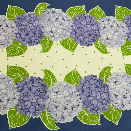 Classic Retro cotton toweling with blue and lavender hydrangeas, green leaves and blue border.