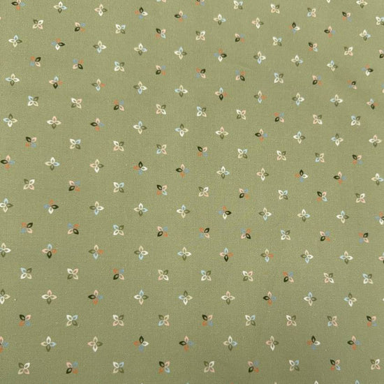 Petalush Meadow sage green cotton fabric by Kiley's Quilt Room for Moda Fabrics, featuring tiny white, peach and blue floral motifs.