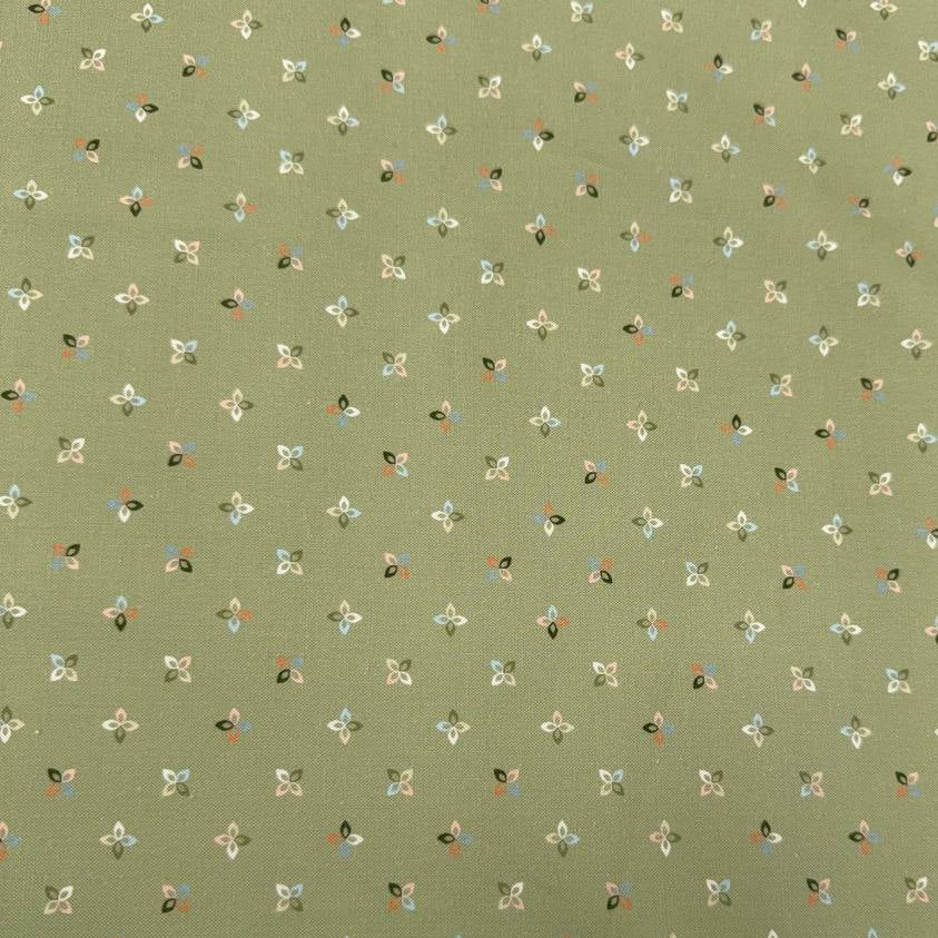 Petalush Meadow sage green cotton fabric by Kiley's Quilt Room for Moda Fabrics, featuring tiny white, peach and blue floral motifs.