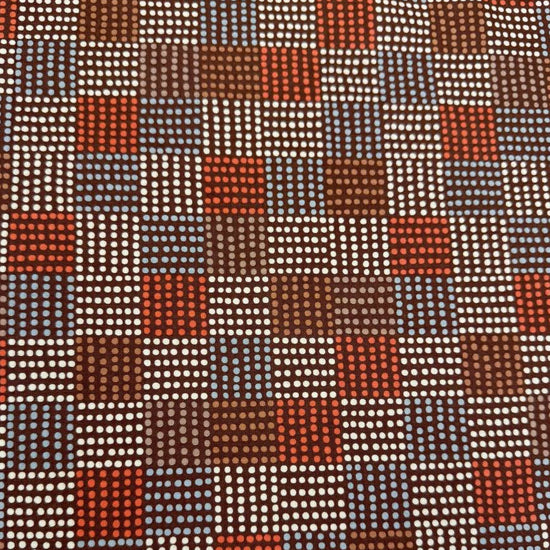 Nature’s Sketchbook by Elena Amo for Moda Fabrics in Bark, dark brown fabric with geometric dotted rectangles in blue, cream and rust orange.
