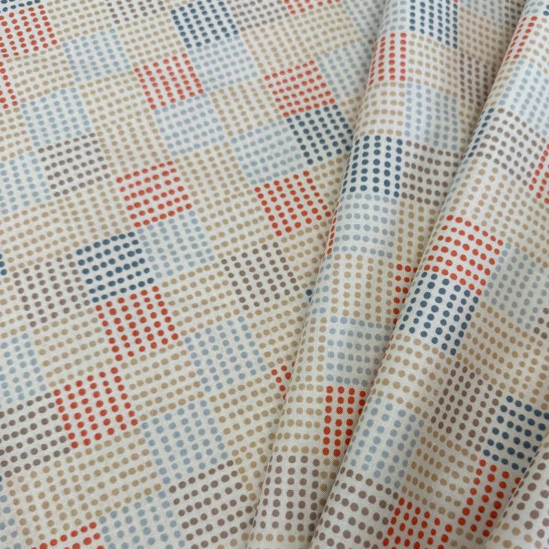 Nature’s Sketchbook by Elena Amo for Moda Fabrics in Pearl, cream fabric with geometric dotted rectangles in blue, beige and terracotta.