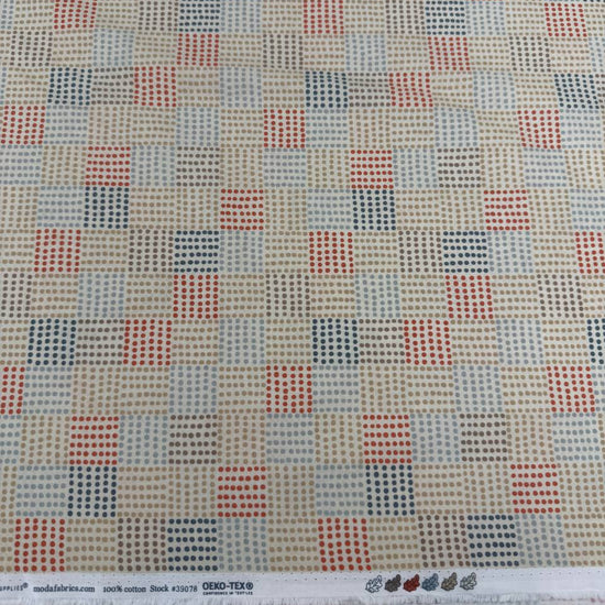 Nature’s Sketchbook by Elena Amo for Moda Fabrics in Pearl, cream fabric with geometric dotted rectangles in blue, beige and terracotta.