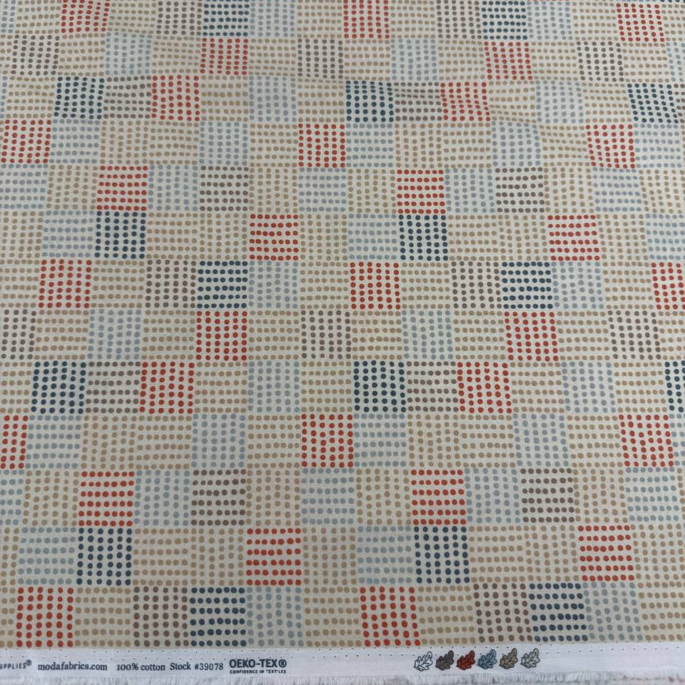 Nature’s Sketchbook by Elena Amo for Moda Fabrics in Pearl, cream fabric with geometric dotted rectangles in blue, beige and terracotta.