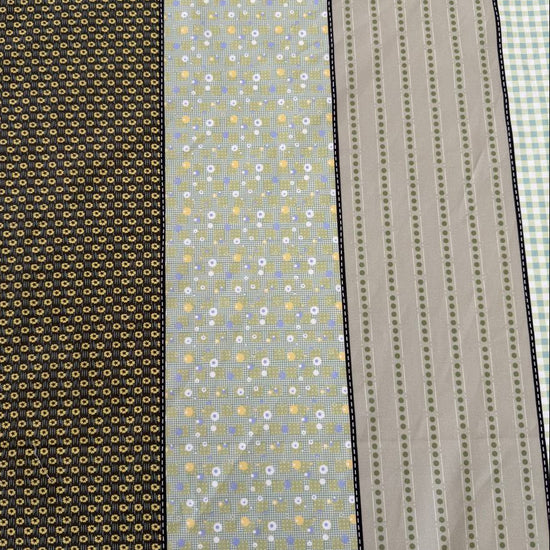 Moda Gathered Lollies Trentham One cotton fabric featuring vertical stripes with floral, gingham and dotted patterns in sage green, olive, beige and cream.