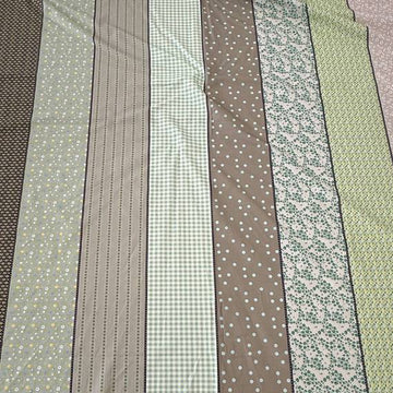 Moda Gathered Lollies Trentham One cotton fabric featuring vertical stripes with floral, gingham and dotted patterns in sage green, olive, beige and cream.