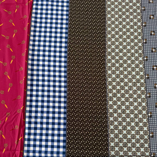 Gathered Lollies cotton fabric by Jen Kingwell for Moda featuring colourful vertical stripes with gingham, floral and geometric patterns in teal, rust, red, navy, brown and cream.
