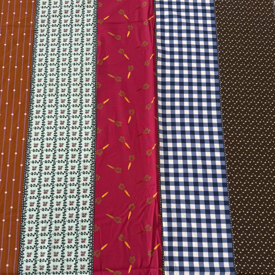 Gathered Lollies cotton fabric by Jen Kingwell for Moda featuring colourful vertical stripes with gingham, floral and geometric patterns in teal, rust, red, navy, brown and cream.
