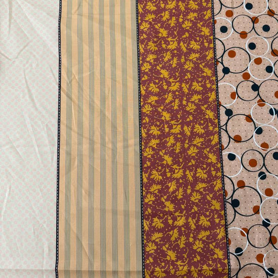 Gathered Lollies cotton fabric by Jen Kingwell for Moda featuring vertical patchwork-inspired stripes with floral and geometric prints in peach, terracotta, burgundy, cream and teal.