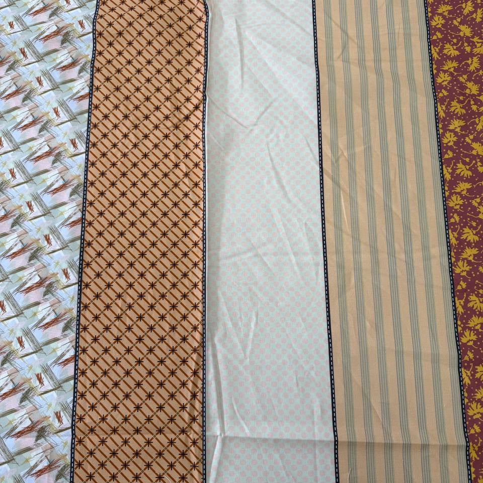Gathered Lollies cotton fabric by Jen Kingwell for Moda featuring vertical patchwork-inspired stripes with floral and geometric prints in peach, terracotta, burgundy, cream and teal.