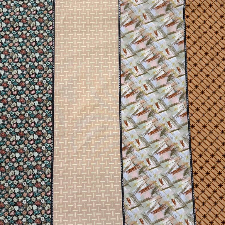 Gathered Lollies cotton fabric by Jen Kingwell for Moda featuring vertical patchwork-inspired stripes with floral and geometric prints in peach, terracotta, burgundy, cream and teal.