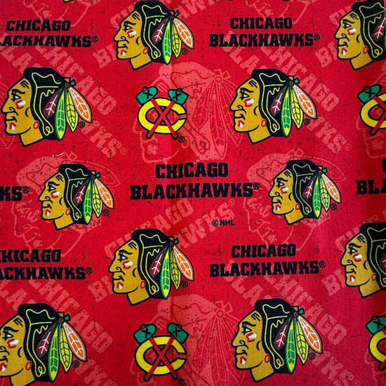 Chicago Blackhawks 100% cotton Fat Quarter fabric measuring 50 × 50 cm with red and black NHL-themed print.