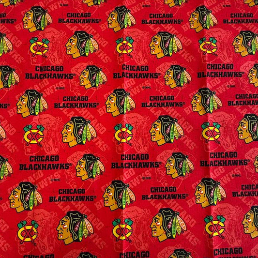 Chicago Blackhawks 100% cotton Fat Quarter fabric measuring 50 × 50 cm with red and black NHL-themed print.