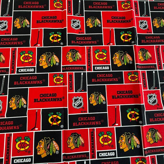 Chicago Blackhawks 100% cotton Fat Quarter fabric measuring 50 × 50 cm with red and black NHL-themed print.
