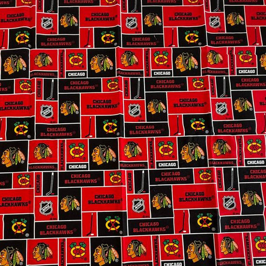 Chicago Blackhawks 100% cotton Fat Quarter fabric measuring 50 × 50 cm with red and black NHL-themed print.
