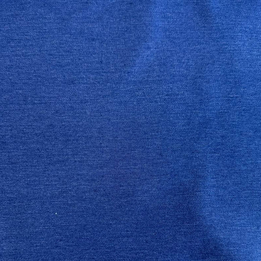 Classic Stretch Denim fabric available in two colors: True Blue and Medium Blue. Medium-weight stretch denim made from 70% cotton, 28% polyester, and 2% spandex, ideal for jeans, jackets, skirts, and dresses.