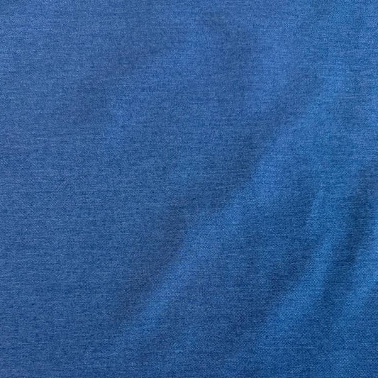 Classic Stretch Denim fabric available in two colors: True Blue and Medium Blue. Medium-weight stretch denim made from 70% cotton, 28% polyester, and 2% spandex, ideal for jeans, jackets, skirts, and dresses.