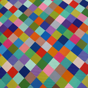 Colorful patchwork geometric quilting cotton fabric from the Animal Alphabet collection by Lewis & Irene, featuring multicolored square blocks on 100% cotton.