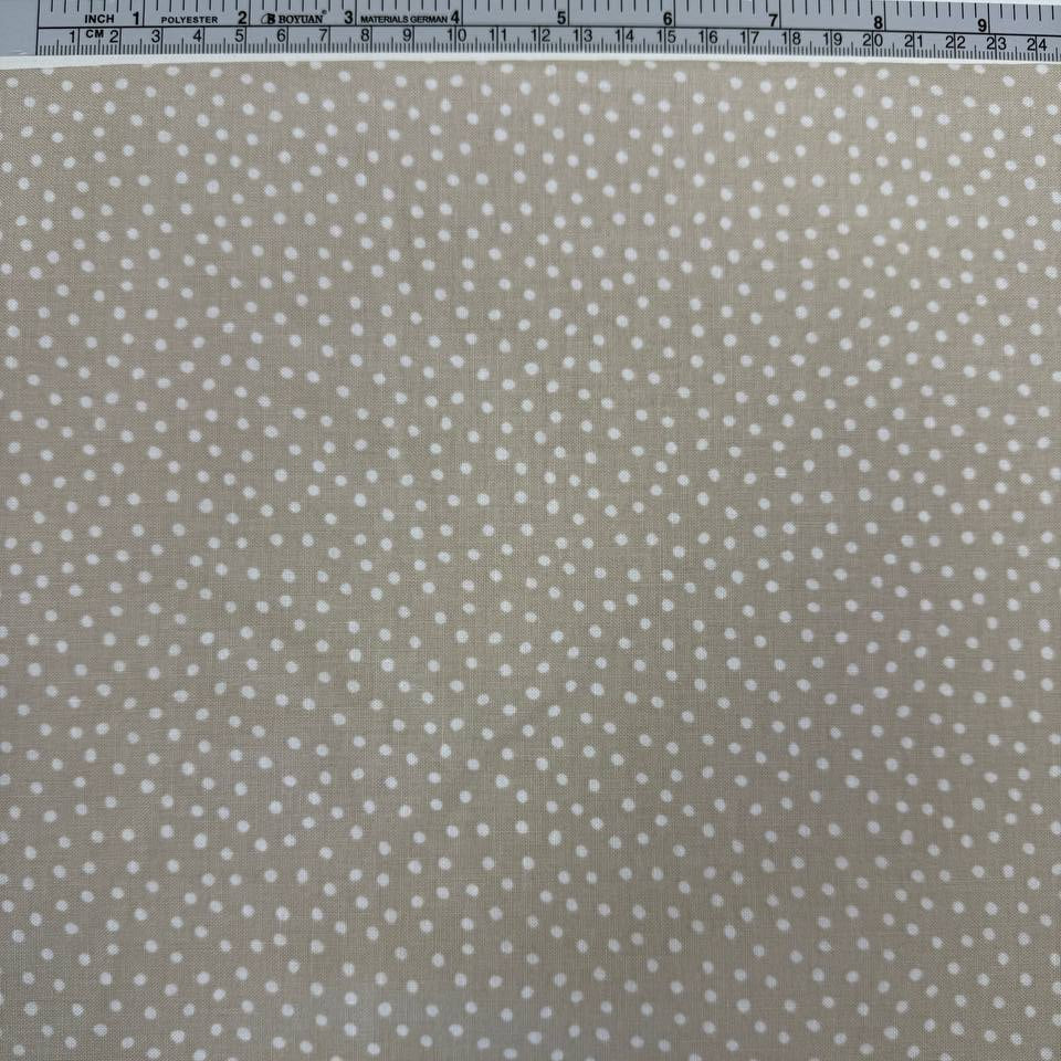 Story Book Dots quilting cotton fabric in taupe with delicate white dotted pattern, 100% cotton, 45 inch wide.