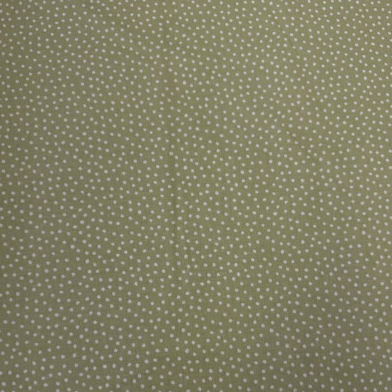 Story Book Dots quilting cotton fabric in green with delicate white dotted pattern, 100% cotton, 45 inch wide.