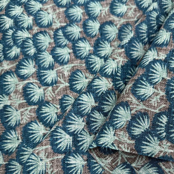 Snow Drift 100% cotton quilting fabric available in Mint and Teal featuring a textured botanical leaf print on 45-inch wide cotton.