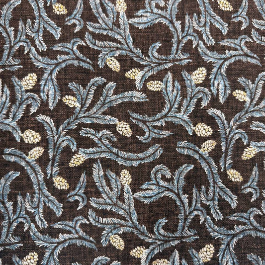 Brown quilting cotton fabric with blue leafy floral vines and cream pinecone print, 100% cotton, 45 inch wide