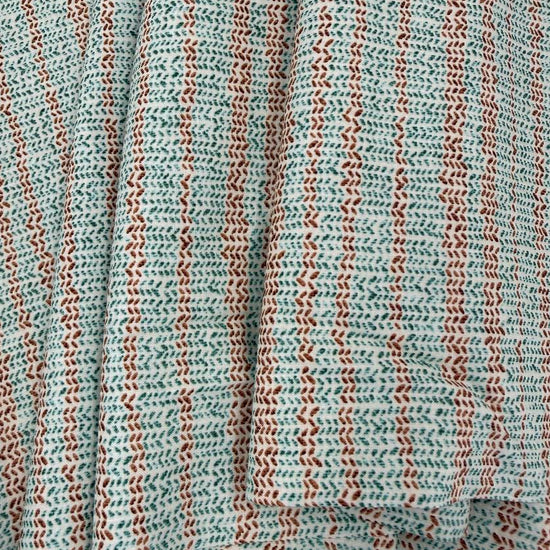 100% cotton quilting fabric featuring textured sage green and brown vertical stripes on a white background, 45 inch wide.