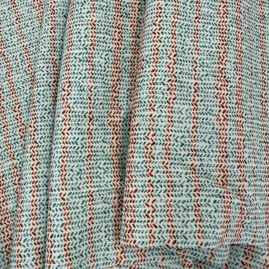100% cotton quilting fabric featuring textured sage green and brown vertical stripes on a white background, 45 inch wide.