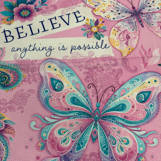 Faith & Grace Panel Multi cotton fabric panel by Nicole DeCamp for Benartex featuring colorful butterflies, floral accents, and the inspirational message "Believe – Anything is Possible."