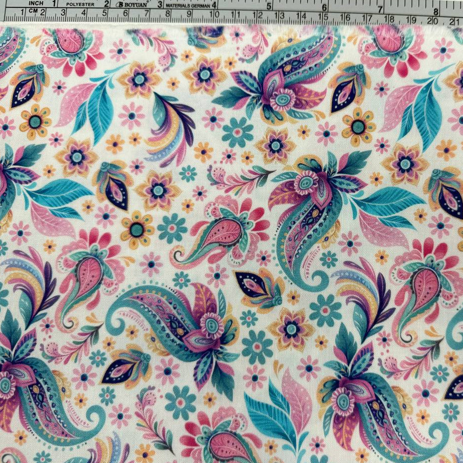 Faith & Grace cotton fabric by Kanvas Studio for Benartex featuring colorful butterflies, paisley motifs, and floral accents on a soft white background.