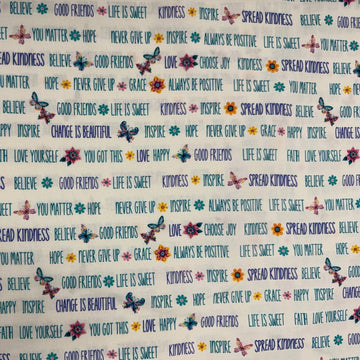 White 100% cotton quilting fabric featuring colorful inspirational words, butterflies, and flowers from the Faith & Grace collection by Kanvas Studio for Benartex.