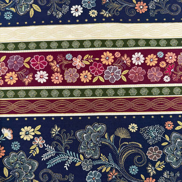 Majestic Garden Metallic Border Stripe quilting cotton by Kanvas Studio featuring decorative floral border stripes with metallic gold accents on a navy background.
