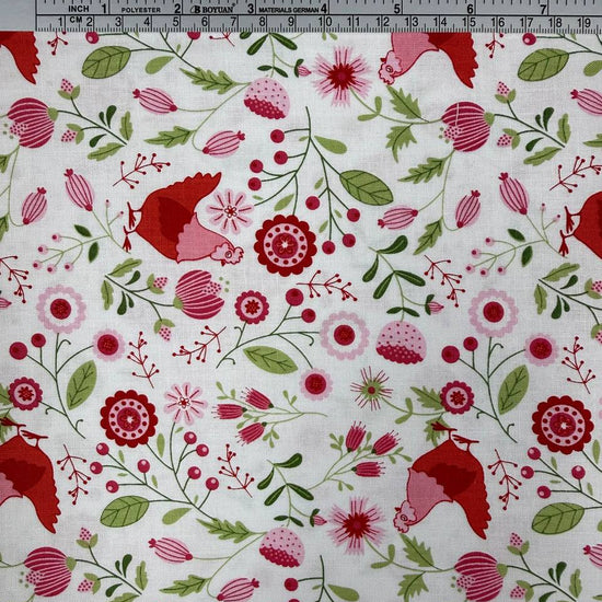 Smitten Chicken Hen House Floral quilting cotton fabric by Poppie Cotton featuring pink and red hens surrounded by flowers, berries, and green foliage on a white background.